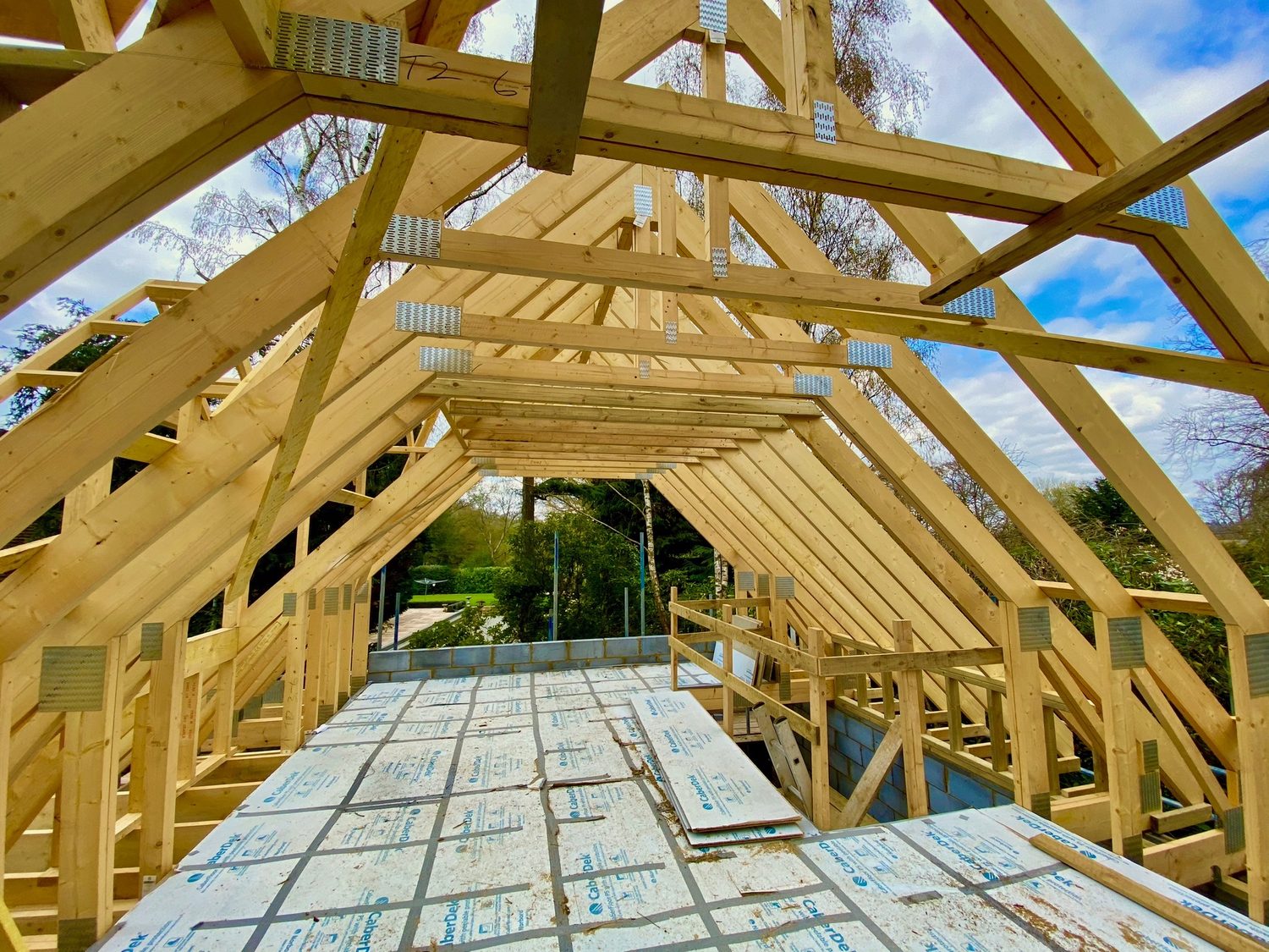New timber roof structure over a loft conversion