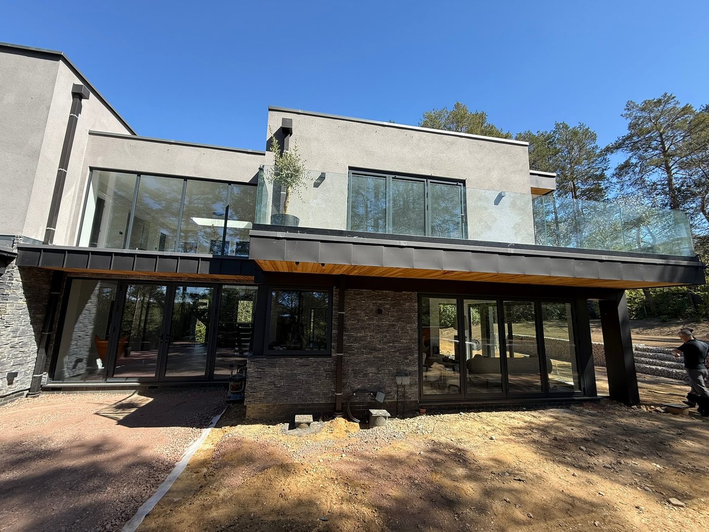 Side elevation of a contemporary new build during final landscaping