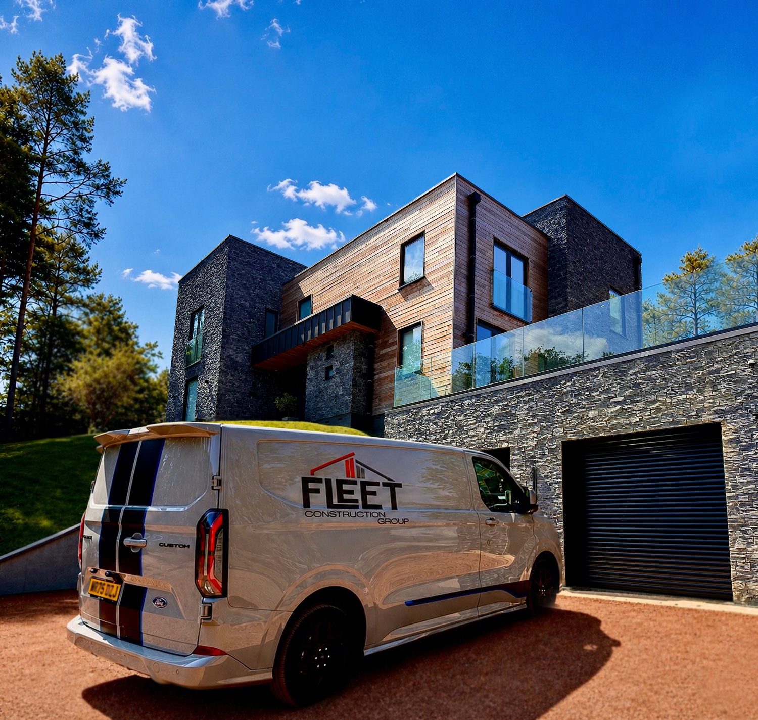 Fleet Construction Group van outside a completed contemporary home