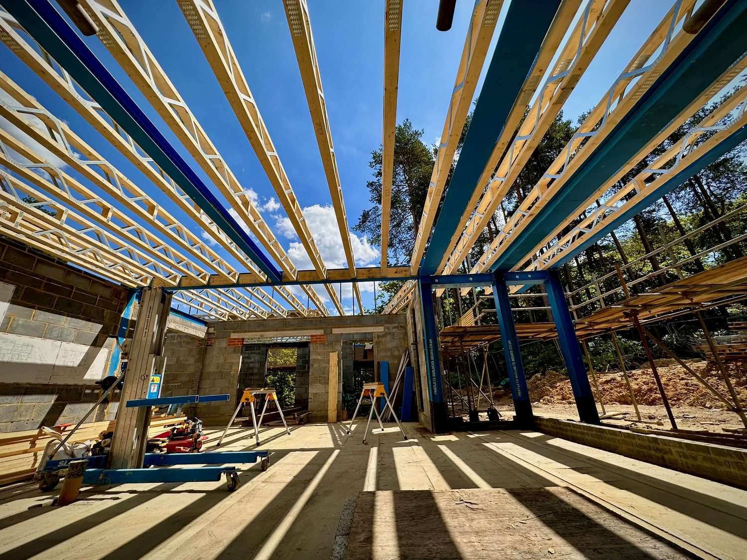 Structural steel beams and new floor joists installed on site